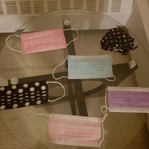 Masks.,earrings and lipgloss